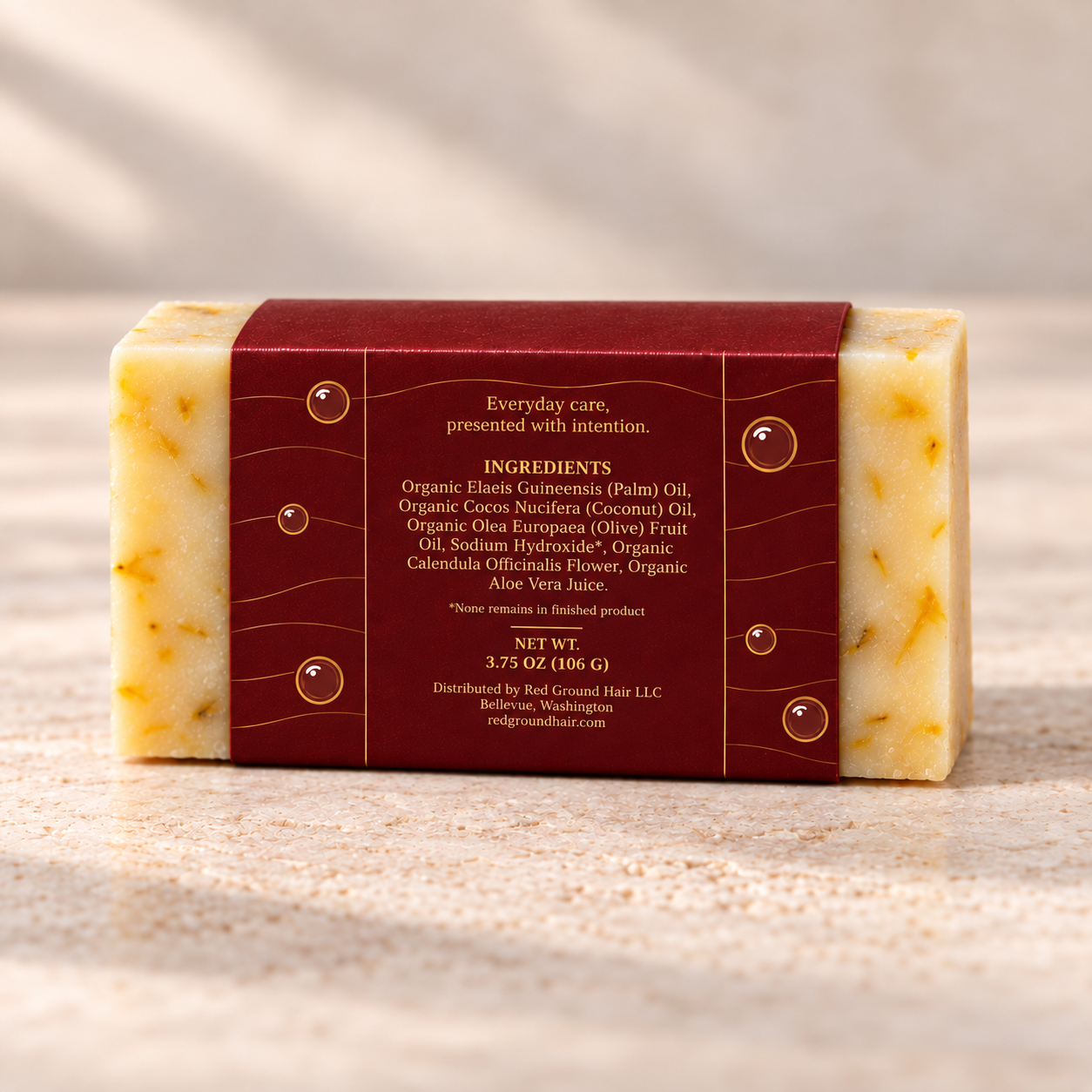 Back of the Aloe Calendula Tender artisan soap sleeve showing its ingredient panel