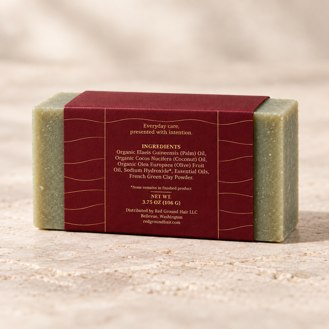 Back of the Geranium Clay Renewal artisan soap sleeve showing its ingredient panel