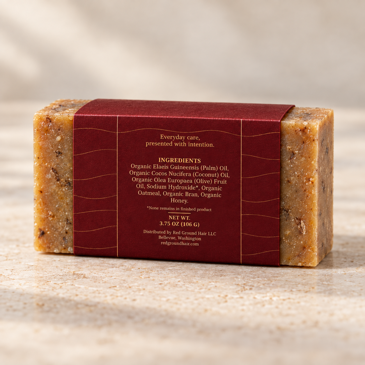 Back of the Honey Oat Comfort artisan soap sleeve showing its ingredient panel