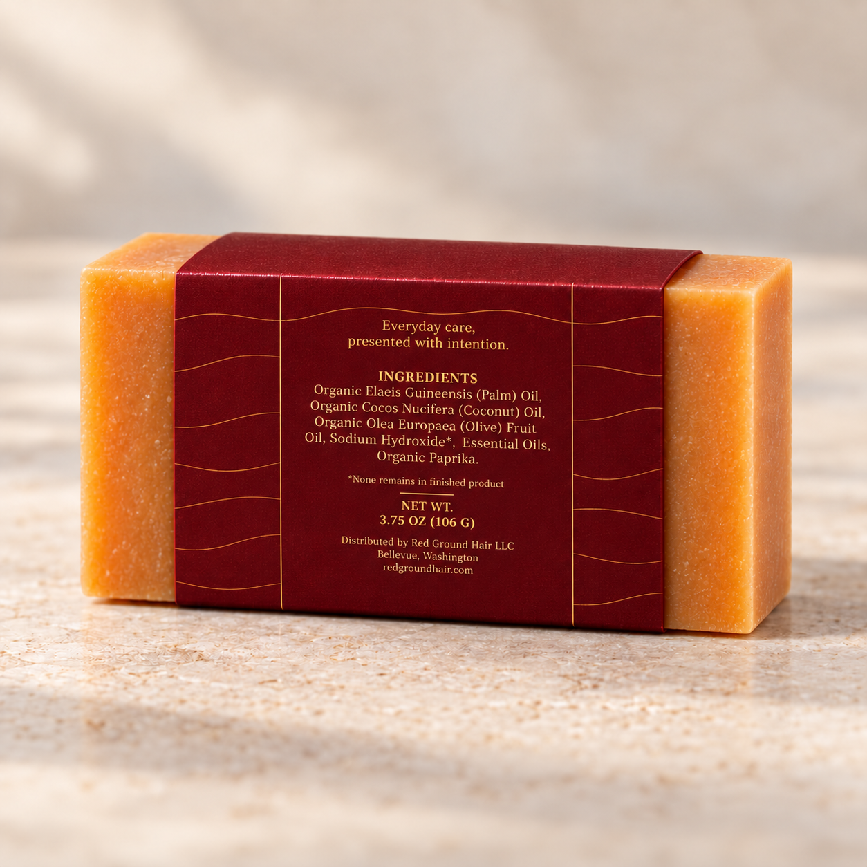 Back of the Sunlit Tangerine artisan soap sleeve showing its ingredient panel
